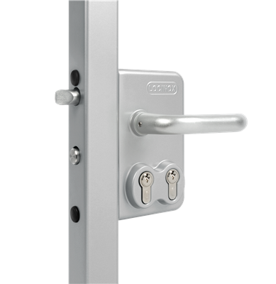 Surface mounted double cylinder gate lock for swing gates